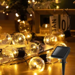 Aigostar 10VRG Solar Lichtsnoer - Lichtslinger Op Zonne-energie - Lampjes Slinger - 20 Transparante LED - 3000K - 5.8 Meter 27 Aigostar 10VRG Solar Lichtsnoer - Lichtslinger Op Zonne-energie - Lampjes Slinger - 20 Transparante LED - 3000K - 5.8 Meter -Tuinwereld Verkoop 1200x1200 1011